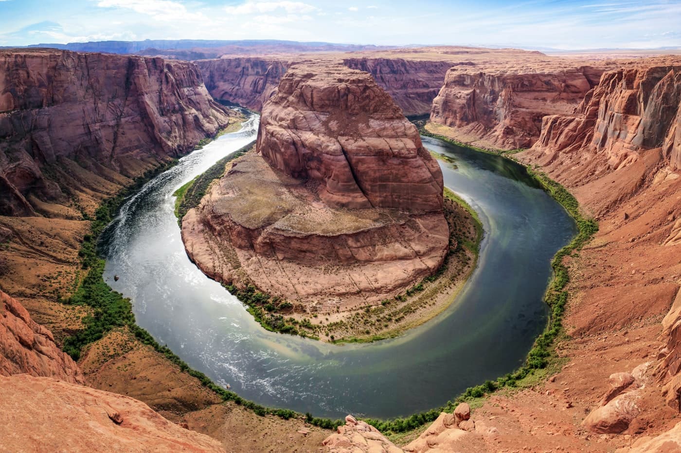 A red rock desert canyon carved by a winding river
