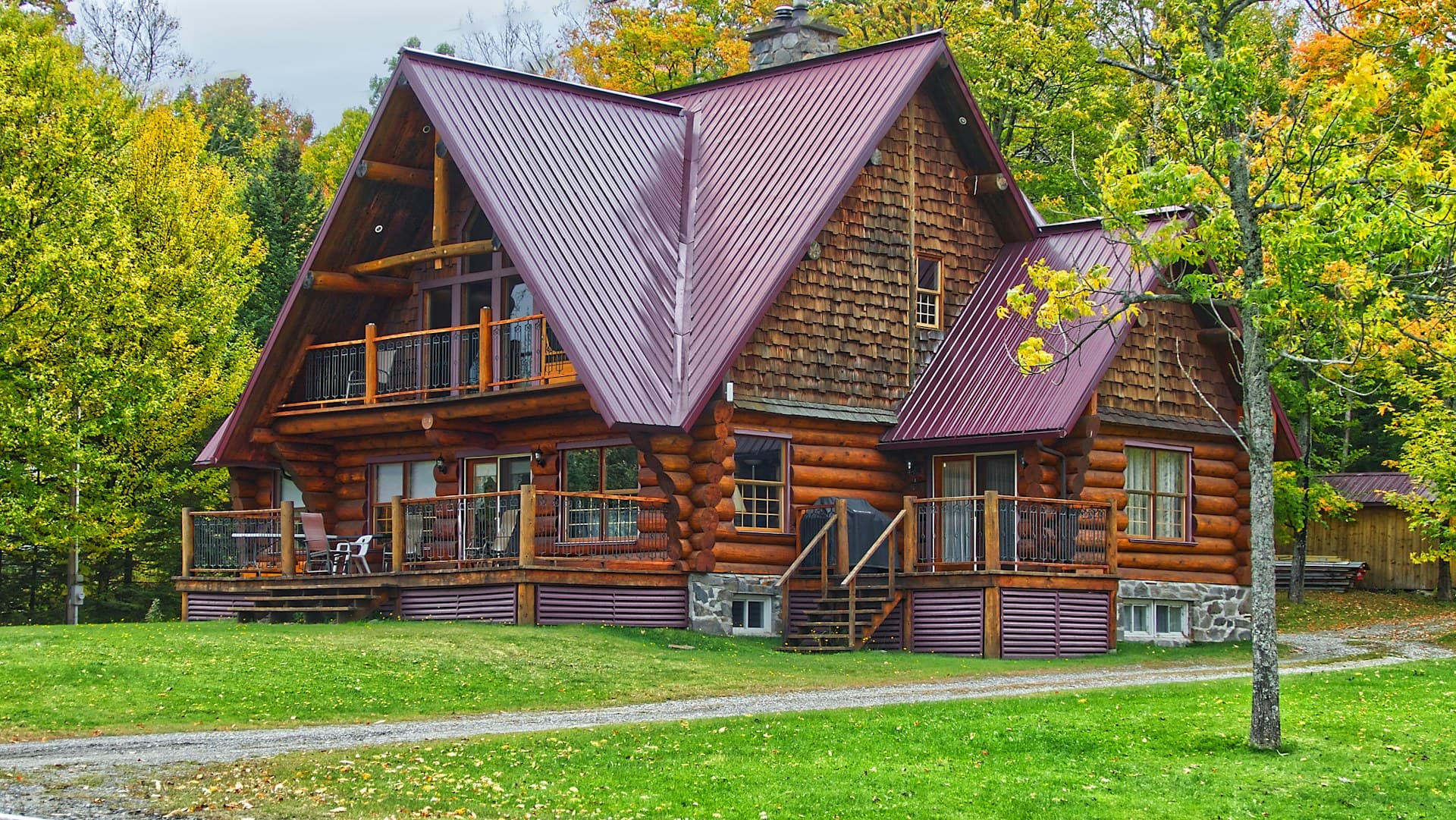 A grand mountain lodge estate beneath the Teton Range