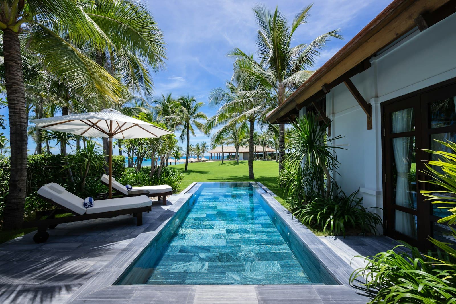 A luxury villa pool at a tropical family resort