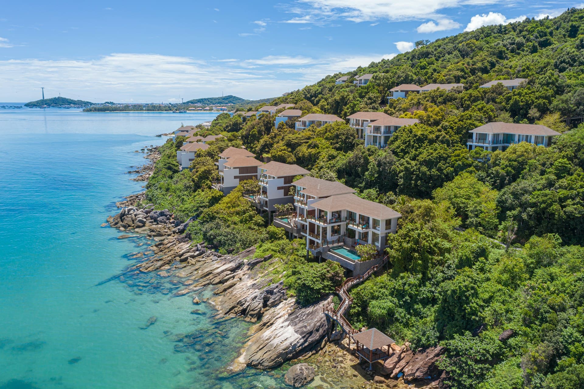 A grand oceanfront resort on a tropical coast