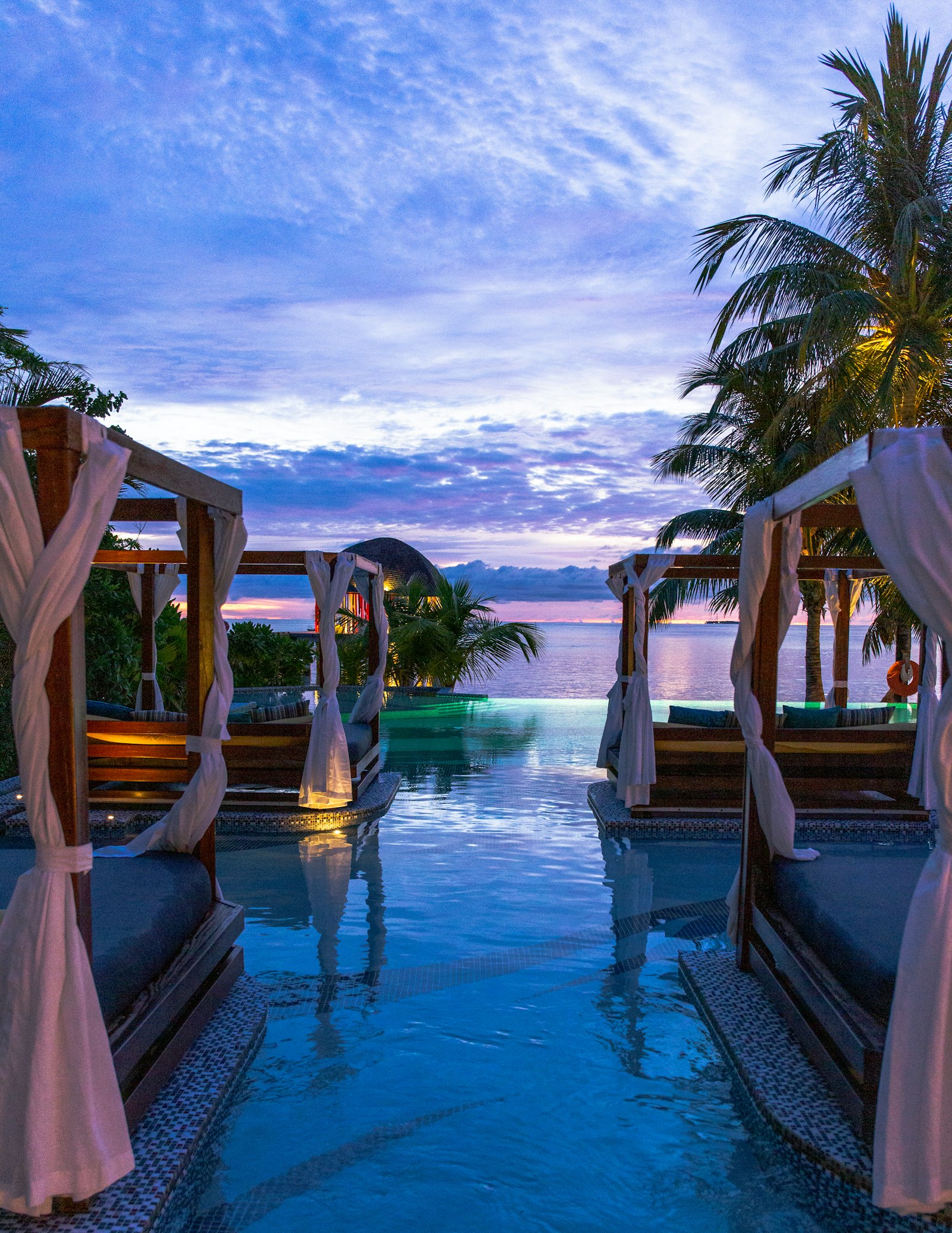 A secluded infinity pool overlooking the ocean with no one else in sight